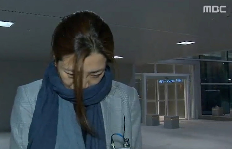 Cho Hyun-min, a senior vice president at Korean Air Lines and a daughter of its chairman Cho Yang-ho, arrives at Incheon International Airport in Incheon, South Korea, in this still image from MBC exclusive news report footage obtained by Yonhap on April 15, 2018.