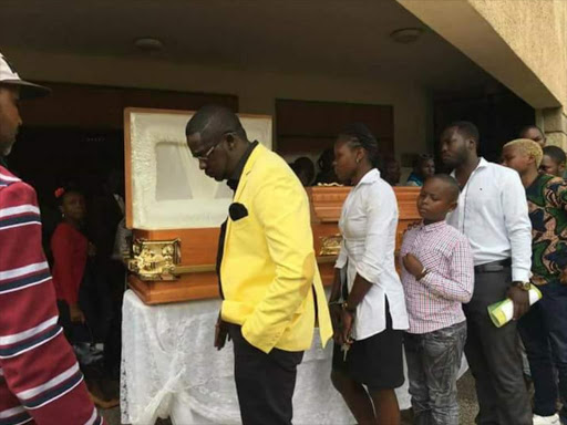 Daniel Ndambuki aka Churchill and other mourners at the funeral service of comedian Ayeiya Poa Poa at Nairobi Pentecostal Church in Karen, April 19, 2017. /COURTESY