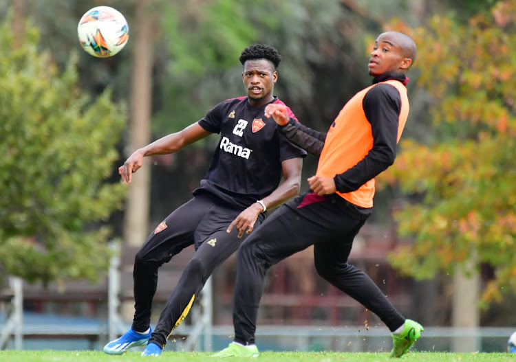 Qobolwakhe Sibande and Athenkosi Mcaba at training during the Stellenbosch FC media open day at Lentelus Sports Ground this week .