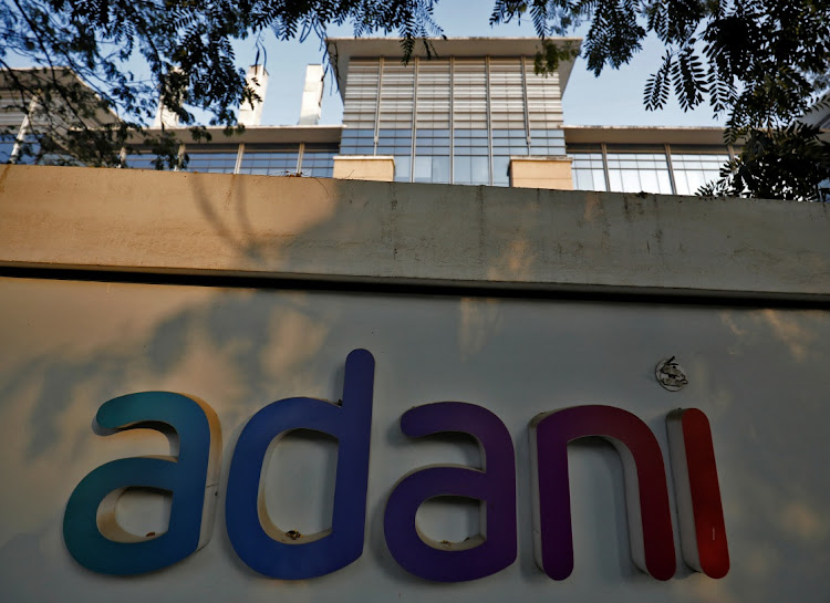 The logo of the Adani Group on the wall of its property office building on the outskirts of Ahmedabad, India, January 27 2023. Picture: AMIIT DAVE/REUTERS