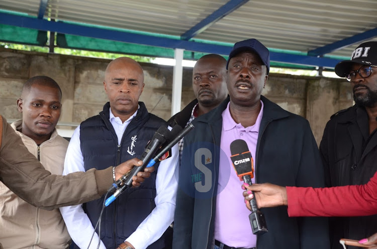 Lawyer Danstan Omari together with other lawyers representing SBL director Josiah Kariuki addressing journalists outside Nairobi Area Police Station on April 6, 2024.