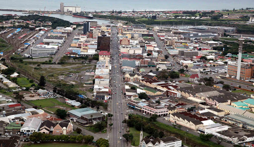 CURRENT VIEW: An aerial view over East London’s CBD shows the port in the background. The main streets from the left of the picture are clearly visible: Station Street on the far left, Cambridge Street, Oxford Street and Buffalo Street to the right Picture: ALAN EASON