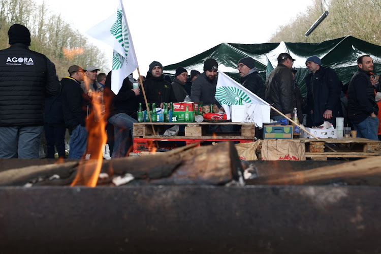 French farmers block the A16 highway to protest over price pressures, taxes and green regulation, grievances shared by farmers across Europe, near Beauvais, France, January 25, 2024. Picture: YVES HERMAN/REUTERS