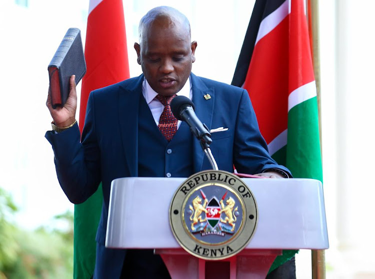 Chief Administrative Secretary in the Ministry of ICT and Digital economy Dennis Itumbi taking oath at State House on March 23, 2023