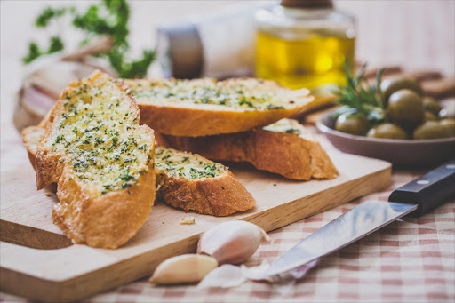 A favourite braai side, South Africans love a good garlic bread.