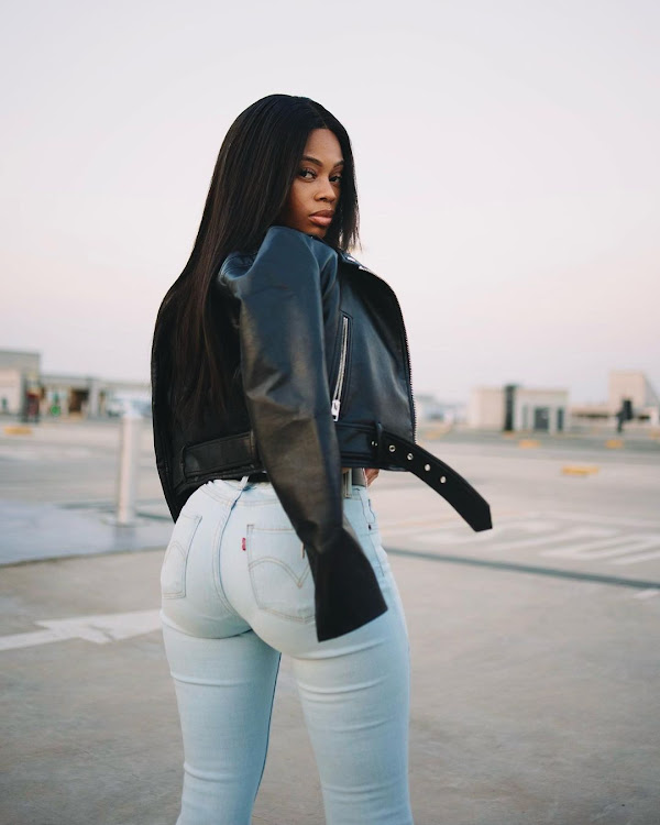 Levi's Curvy jeans come in a variety of washes, such as the light wash worn here by model and YouTuber Sasha Langa.