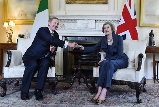 Britain's Prime Minister Theresa May (R) poses for photographers with Ireland's Taoiseach Enda Kenny inside 10 Downing Street, London, Britain July 26, 2016.