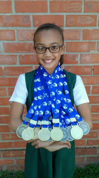 Myra Viduya with her medals