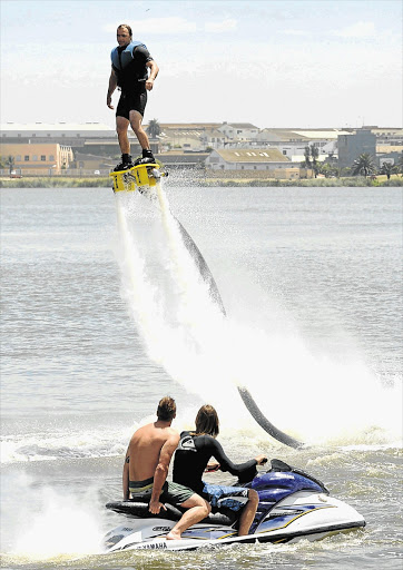 Kobus Sandenbergh rides a flyboard on North End Lake, Port Elizabeth, at the weekend. A flyboard is a water jetpack attached to a propulsion craft. It was invented by Frenchman Franky Zapata in 2011