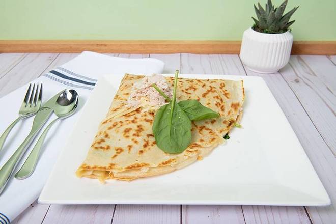 Turkey & Swiss Crepe: Enjoy a classic pairing: tender turkey with the creamy richness of Swiss cheese, all complemented by fresh baby spinach. A satisfying blend that's a delight for your taste buds.