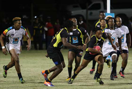 UFH Blues' Luhle Kenene charges forward during their game against the University of KwaZulu-Natal's Impi last night at University of Fort Hare in Alice. Picture: SILUSAPHO NYANDA