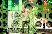 DJ Khaled gets slimed on stage at Nickelodeon's 2019 Kids' Choice Awards at Galen Center on Saturday in Los Angeles, California.