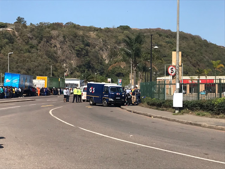 Police cordoned off an area outside the Value Centre in Springfield after a shootout with would-be cash-in-transit robbers. File photo.