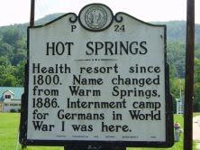 Health resort since 1800. Name changed from Warm Springs, 1886. Internment camp for Germans in World War I was here.Plaque via North Carolina Highway Historical Marker Program, and is used with...