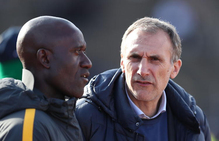 Newly appointed Kaizer Chiefs head coach Giovanni Solinas (R) chats to his assistant Patrick Mabedi during the Maize Cup match between Kaizer Chiefs and Buya Msuthu at the James Motlatsi Stadium, Orkney on July 14 2018.