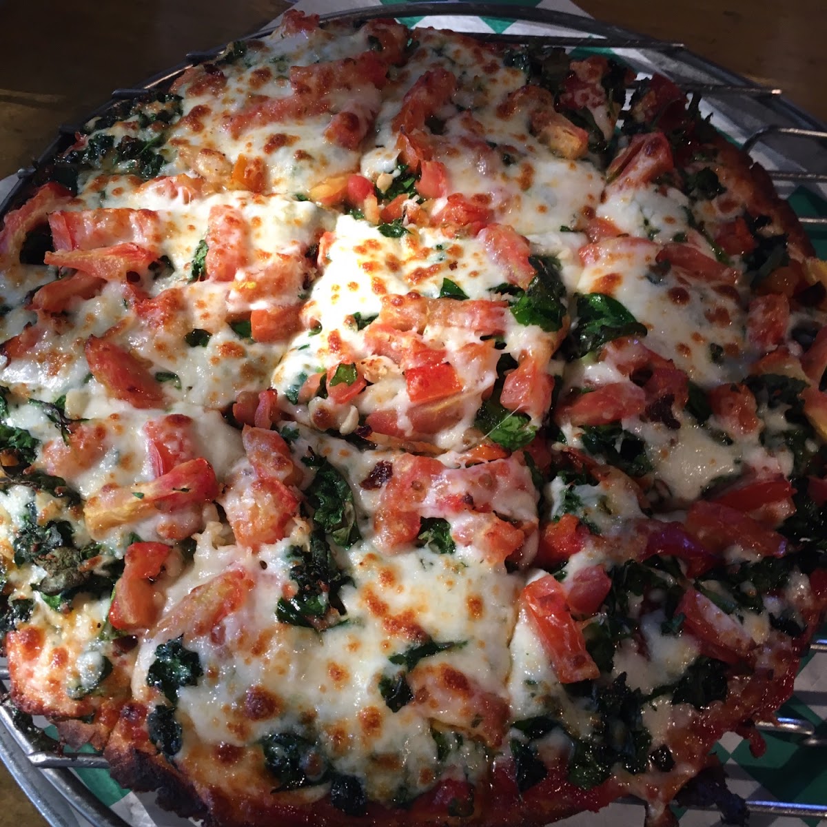 Their GF pizza is a 10" option. I tried the "Signature" Fresh Spinach & added Pepperoni which was very tasty! (Not sure if celiac-friendly though)
