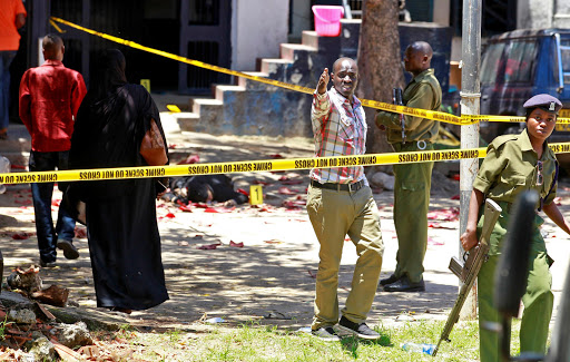 Police and bomb experts secure the Central police station after an attack in Mombasa on September 11 / REUTERS