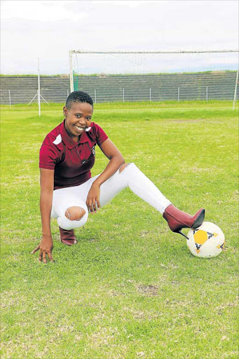 HAVING A BALL OF A TIME: EC Bees team manager Zama Nene says she’s all woman – but her career comes first right now Picture: MKHULULI NDAMASE