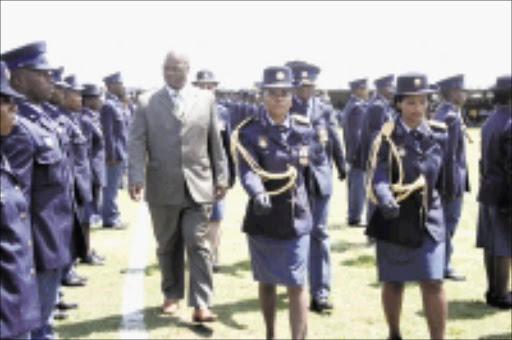 THIN BLUE LINE: Minister Nathi Mthethwa inspects a guard of honour in memory of policemen and women who lost their lives in the line of duty. 27/01/09. Pic. Thuli Dlamini. © Sowetan.