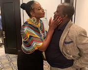 ANC MP Boy Mamabolo says he regularly gives 'friendly kisses' to people he knows. He is pictured here with Netball SA president Cecilia Molokwane.