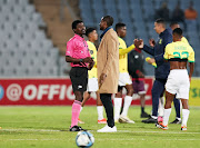 Mamelodi Sundowns coach Rulani Mokwena in discussions with referee Jelly Chavani after the DStv Premiership match against Moroka Swallows at Dobsonville Stadium on Monday night.  