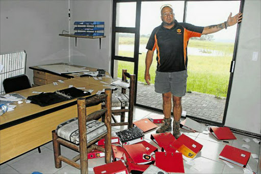 RANSACKED: Brakfontein business man Fritz Joubert shows damage caused on his farm office after it was broken into, allegedly by his neighbour’s son Picture: BHONGO JACOB