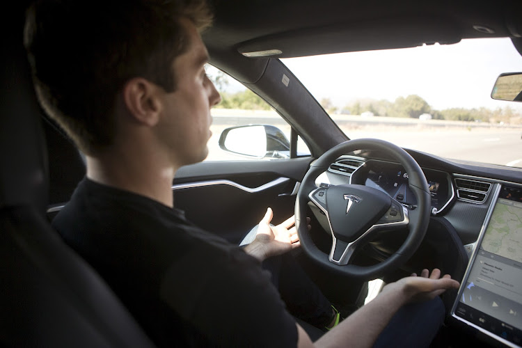 Tesla will deploy an over-the-air software update in the US to encourage drivers to adhere to their continuous driving responsibility. Picture: REUTERS