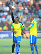 Yannick Zakri of Malmelodi Sundowns receiving a yellow card during the Absa Premiership match between Highlands Park and Mamelodi Sundowns at Makhulong Stadium on May 27, 2017 in Johannesburg, South Africa.