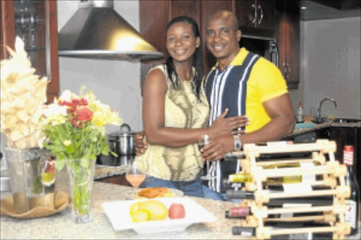 DINING IN: Busayo and Olusola Olubiyi spend lots of time cooking together in their kitchen since they got married. (This photo is used for illustrative purposes.) Photo: FREDLIN ADRIAAN