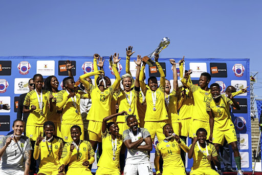 The much-improved Banyana Banyana with the Cosafa Women's Championship trophy.