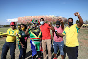 Vaccinated Bafana Bafana supporters outside the stadium before the match on Tuesday. 