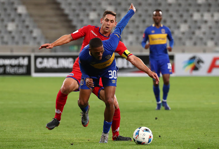 Craig Martin of Cape Town City is being challenged by Dean Furman of SuperSport United as Teko Modise watches on from behind during the Absa Premiership match at Cape Town Stadium, Cape Town on 14 April 2018. The match ended goalless.