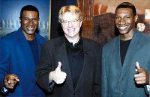 FAMILY AFFAIR: Brothers Ken and Rich Nta of Kenrich Promotions with controversial US talk show host Jerry Springer. © Unknown