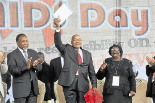 FIGHTING THE SCOURGE: Deputy President Kgalema Motlanthe, left, President Jacob Zuma and Eastern Cape Premier Noxolo Kiviet during the 23rd World Aids Day commemoration in Port Elizabeth yesterday.