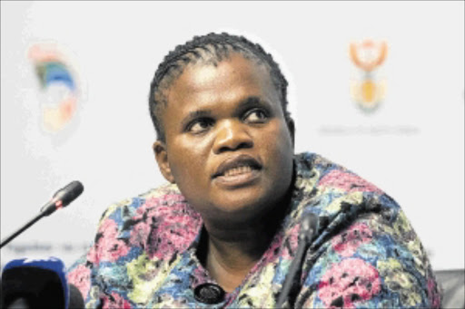 June 26, 2014. Faith Muthambi, new Communications minister, briefs the media. Pic: Trevor Samson. © Business Day.