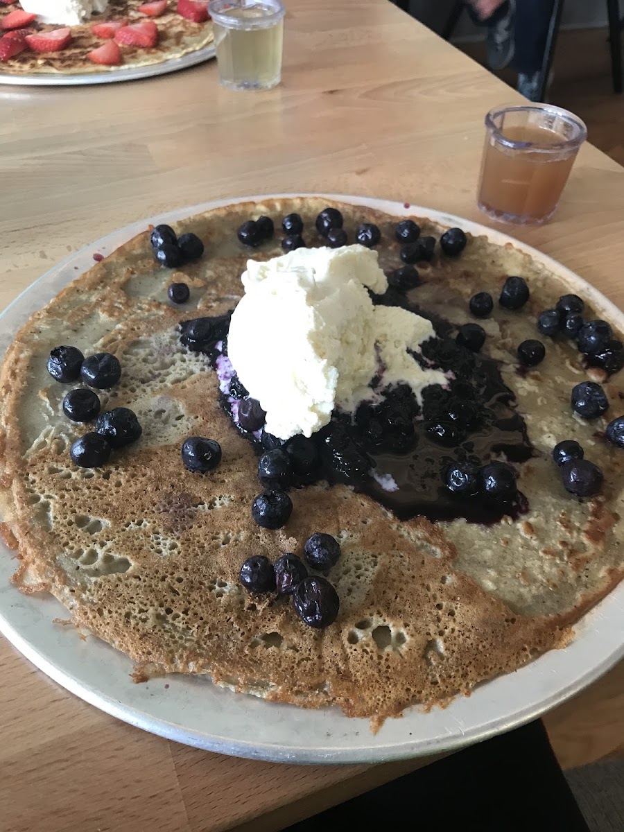 Gluten free pancake with blueberries, compote & ice cream with a lemon ginger syrup. My son loved every bite!