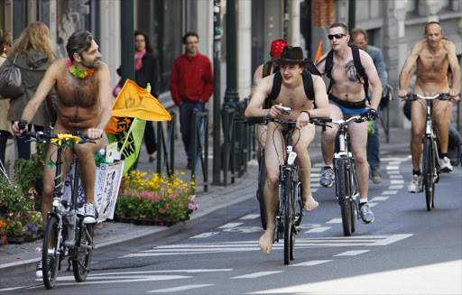 Cyclists ride during the World Naked Bike Ride in Brussels June 18, 2011. This annual manifestation is performed to demand more respect for cyclists on the streets and to promote the bike as an alternative non-polluting transportation vehicle. REUTERS/Francois Lenoir