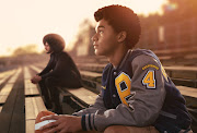 Jaden Michael (right) as a young Colin Kaepernick in 'Colin in Black and White'.