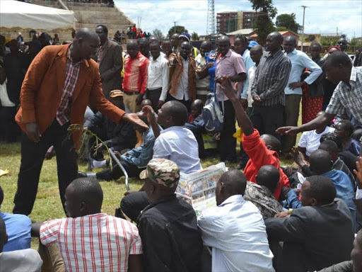 Hundreds of Kapsabet town residents converge at Kipchoge Keino Stadium for prayers following DP William Ruto and journalist Joshua Sang's victories at the ICC, April 6, 2016. Photo/BARRY SALIL