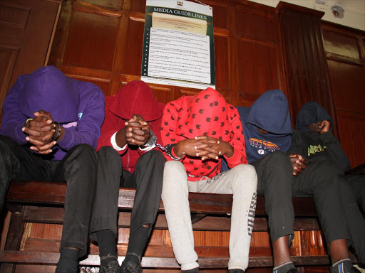 Lang'ata high school students at Milimani law court where they denied to charges of arson. Primary school heads have expressed concern that pupils are becoming radicalised /PHILIP KAMAKYA