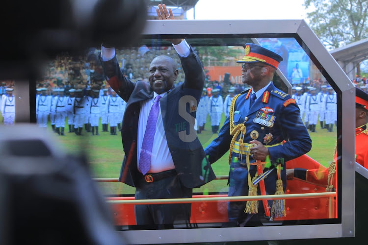 President William Ruto and Chief of Defence Forces Francis Ogolla inspecting guard of honour at Moi Stadium during Kenya's 60th Madaraka Day celebrations on June 1, 2023.