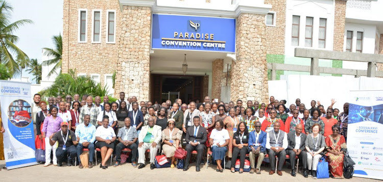 SCECSAL Delegates led by Kenya Library Association president Prof Peter Gatiti (4th right)