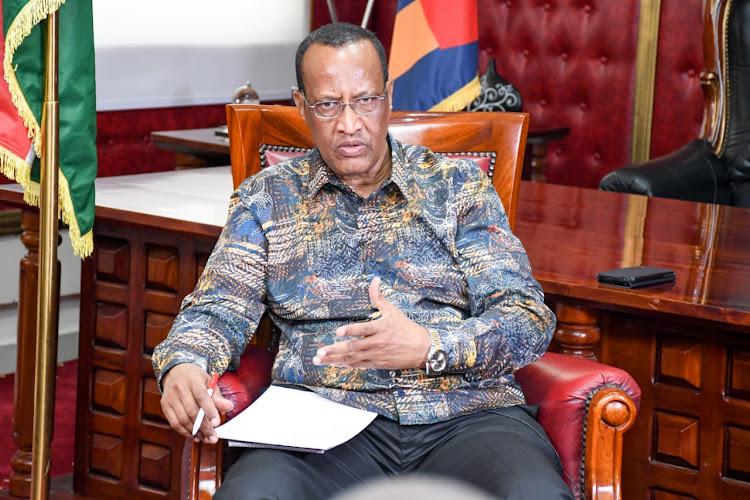 Garissa Governor Nathif Jama explains a point during the interview in his office.