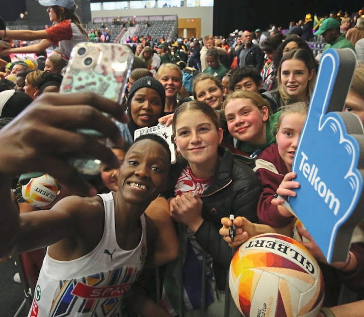 Inspiration: Proteas captain Bongiwe Msomi with fans during the Netball World Cup. Picture: Gallo Images/Shaun Roy