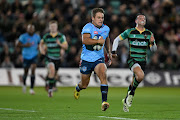 Sebastian de Klerk on his way to scoring one of the three tries by the Bulls in their Champions Cup loss to Northampton.  