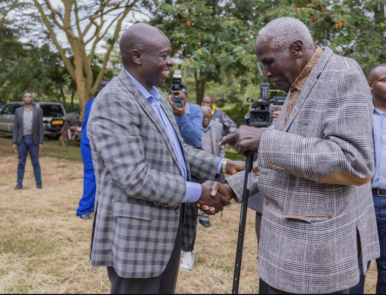 Deputy President Rigathi Gachagua shaking hands with long-serving Ndeiya Councillor Stephen Ndung'u Njenga at his home on Sunday, May 5, 2024.