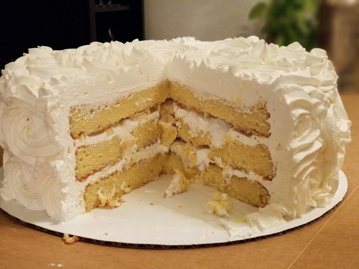 Coconut cake with coconut filling with whipped icing