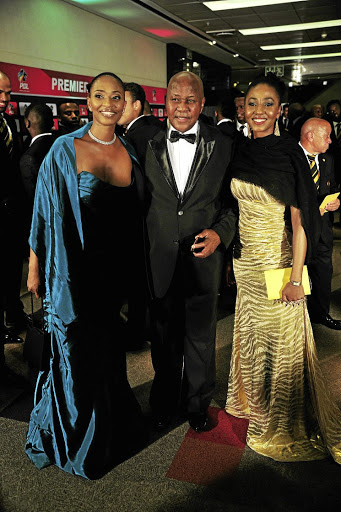 Jessica Motaung, left, Kaizer Motaung and Kemiso Motaung during the PSL Player of the Year awards at Sandton Convention Centre in Johannesburg. / Veli Nhlapo