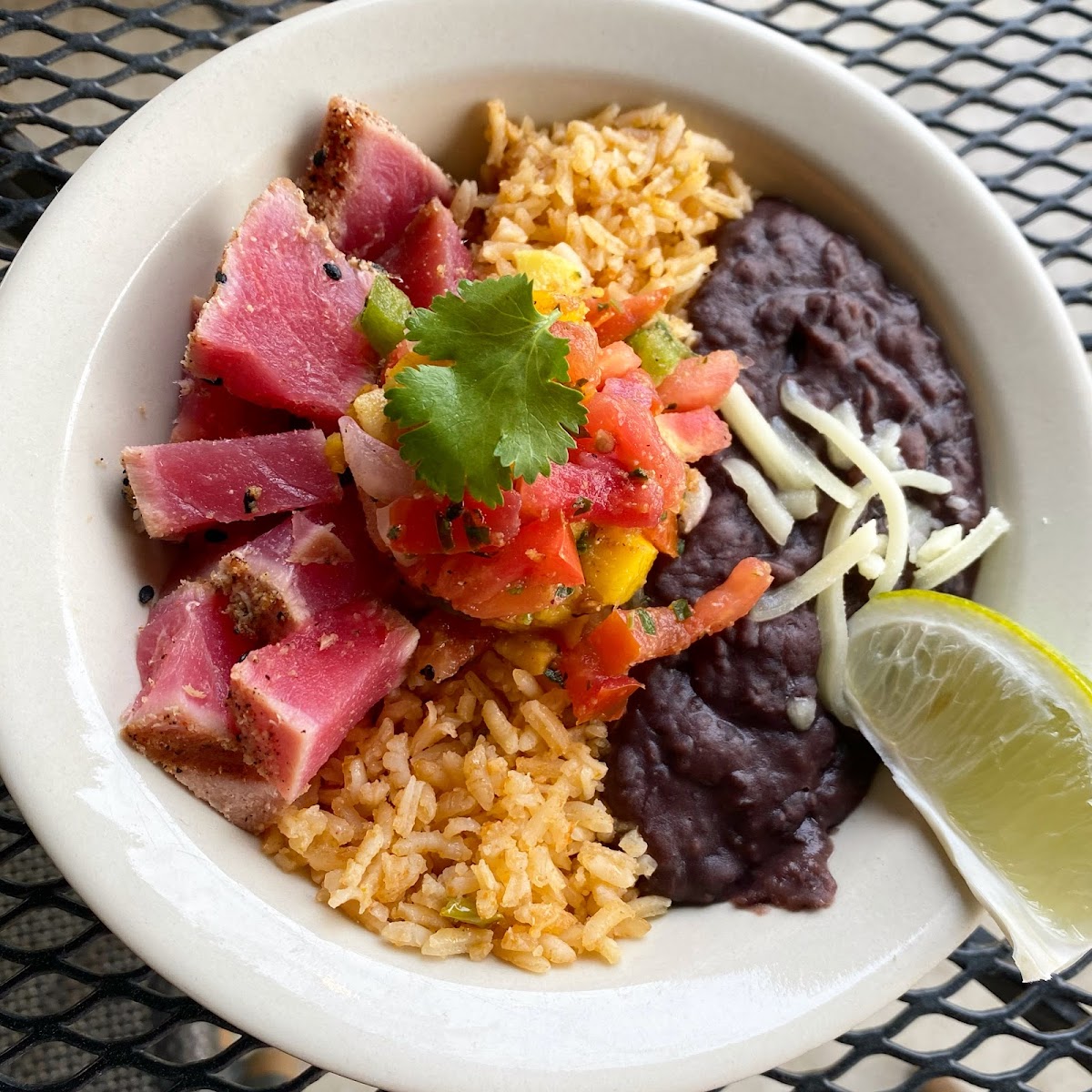 Ahi Baja Bowl with seared (cool red center.  Yes, we recommend our tuna to be served rare.  It's sushi-grade & tastes better seared).  Rice & beans are GF.