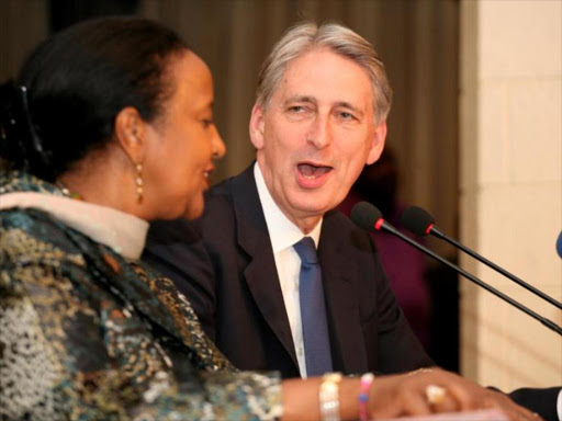 Foreign Affairs PS Amina Mohamed and British Secretary Philip Hammond at the Intercontinental Hotel June 2, 2016. The two held bilateral talks centred on trade between the two countries. Photo/ENOS TECHE.